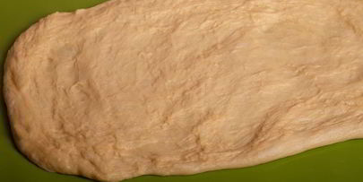 кулич с изюмом, цукатами и вяленой клюквой