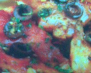 Кролик с оливками и чесноком