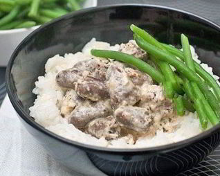 Куриные сердечки, тушеные в сметане