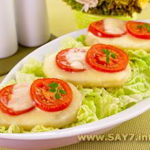 Рецепт Картофель, запеченный с помидорами и сыром