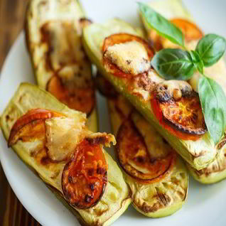 Запеченные кабачки с помидорами