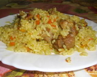 Рассыпчатый плов из свинины