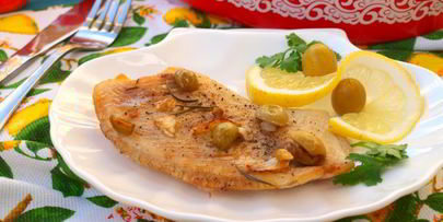 филе тилапии запеченное с лимоном и оливками