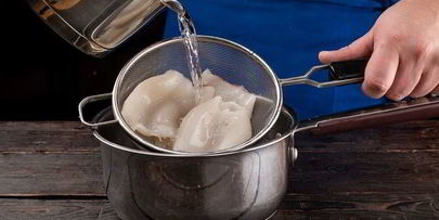 кальмары, фаршированные рисом и яйцом