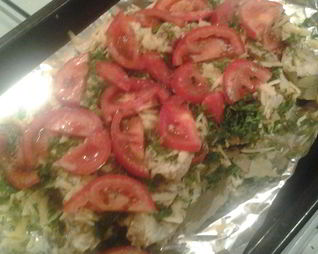 Треска, запеченная с сыром и помидорами