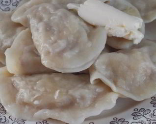 Вареники с квашеной капустой и мясом