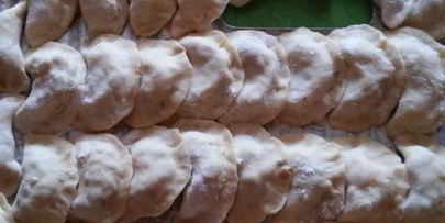 вареники с квашеной капустой и мясом