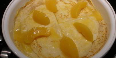 блинчики островные с персиками и коньяком