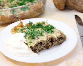 Фаршированные блины с сыром и грибами