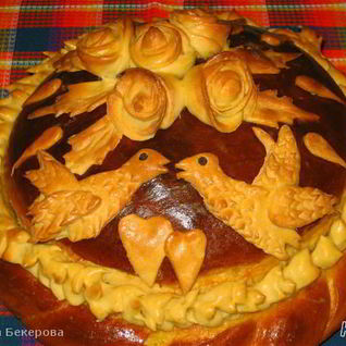 Каравай круглый сладкий дрожжевой хлеб