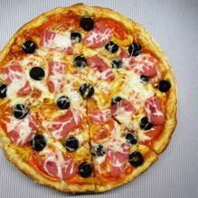 Рецепт Пиццы с ветчиной, помидорами и маслинами