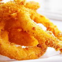 Рецепт Зажаристые луковые кольца в кляре